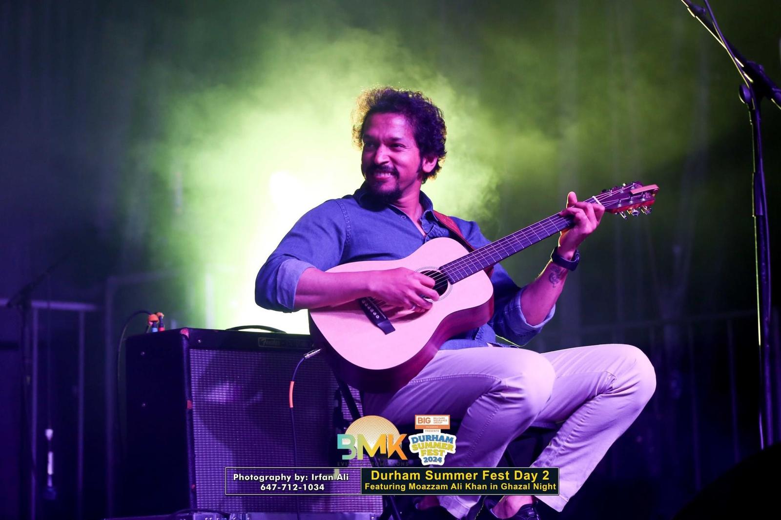 Glen Fernandez playing guitar